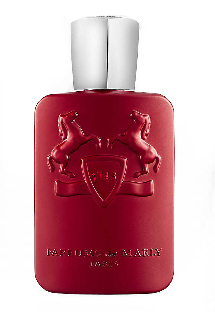 Red perfume bottle with silver cap on a white background